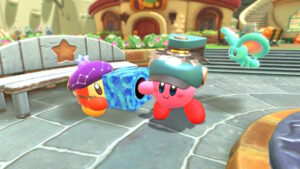 Kirby pioche une nouvelle figurine gatcha dans Kirby et le Pays des Étoiles Filantes