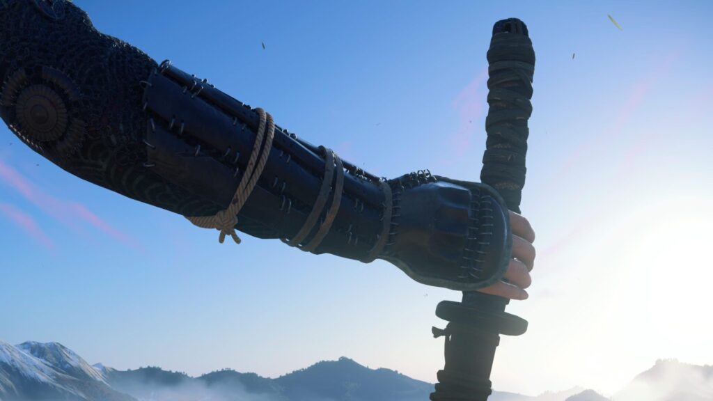 Gros plan sur le bras d'Atsu qui attrape le pommeau de son katana dans Ghost of Yōtei