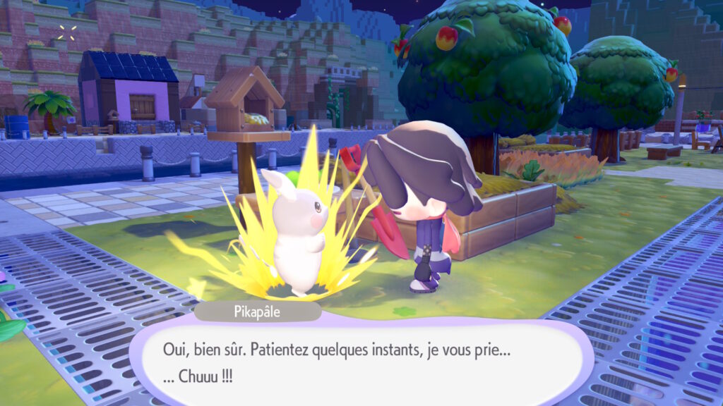 Pikapâle lance une attaque électrique devant Métamorph dans Pokopia
